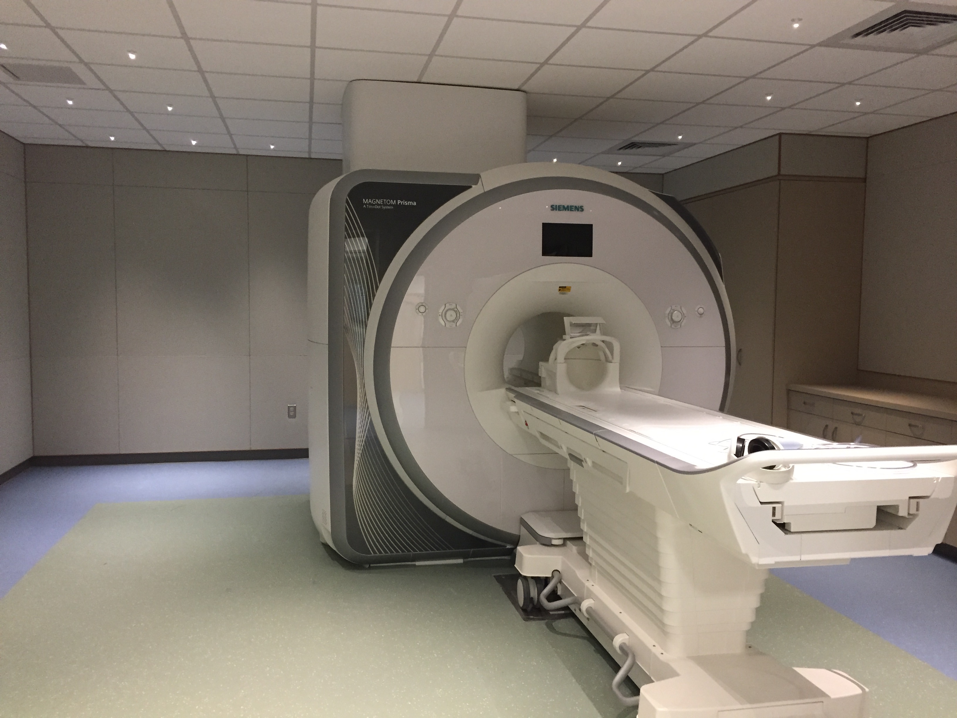 A magnetic resonance imaging machine with the scanner table pulled out